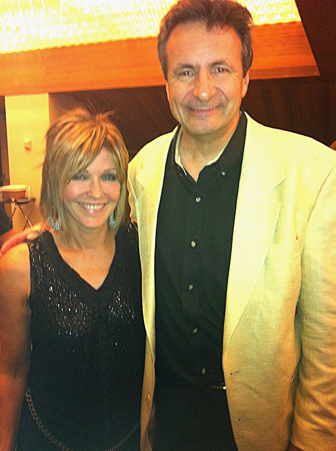 A man and a woman pose for a photo.