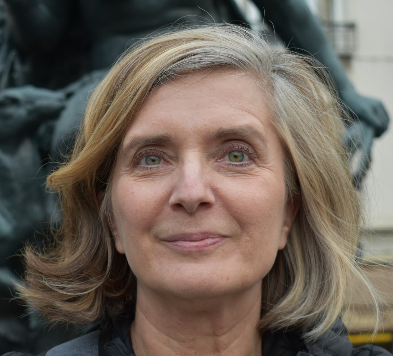 Head shot of a woman with a neutral expression
