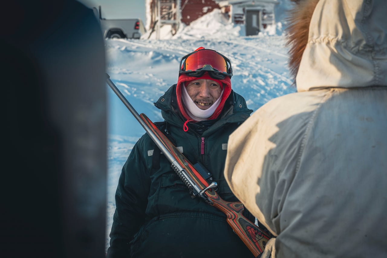 A member of the Canadian Rangers holding a C19 rifle in preparation to depart on the long-range patrol as part of Operation NANOOK-NUNALIVUT in Tuktoyaktuk, Northwest Territories on 4 March, 2026.  Photo: Corporal Aaron Clark, Imagery Technician, Can