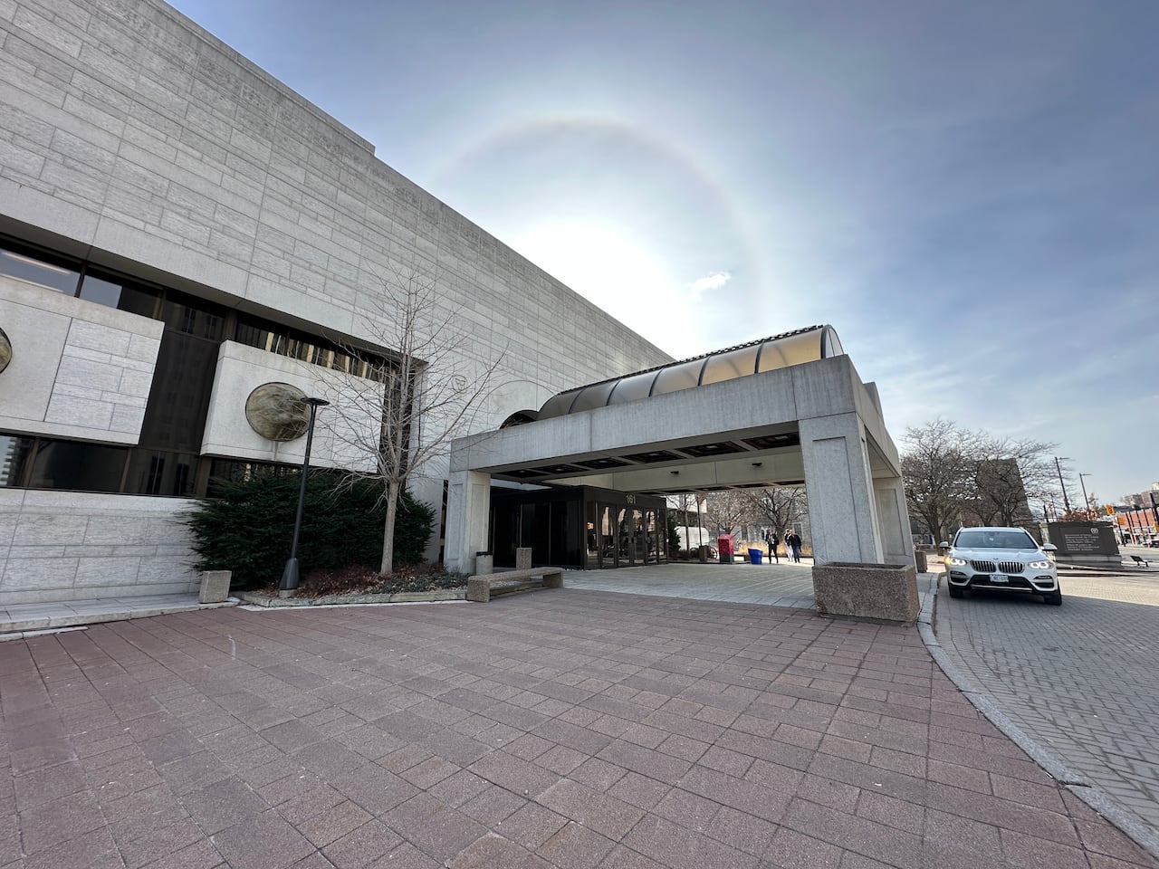A city's courthouse on a sunny spring day.