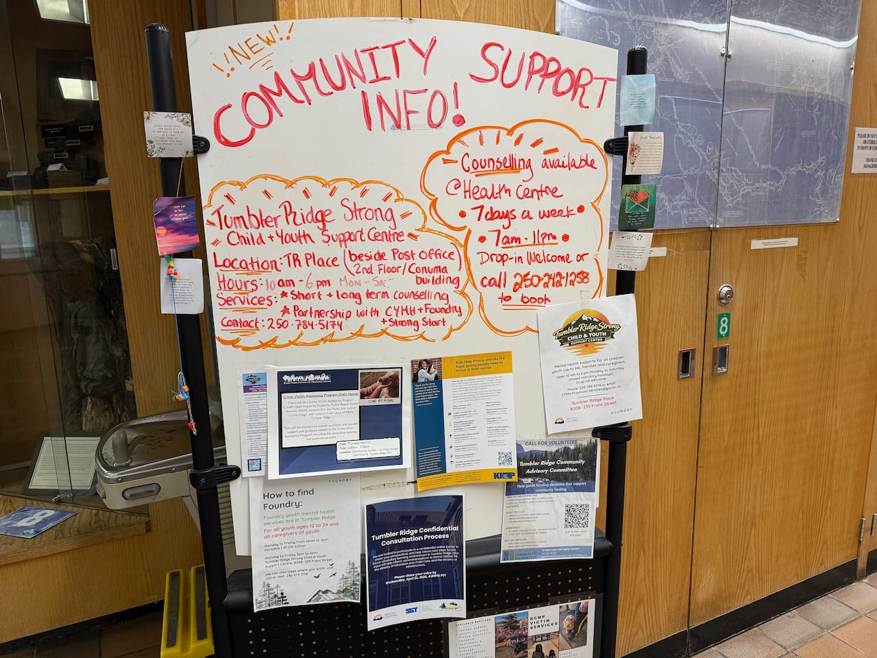 A board inside the Tumbler Ridge community centre with a list of available support for residents.