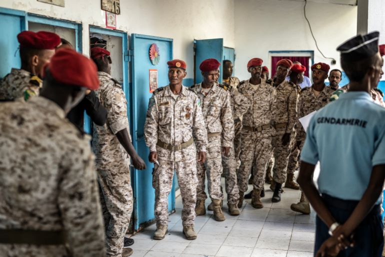 Members of the Djiboutian army queue to cast their votes at a primary school serving as a polling station in Djibouti, on April 10, 2026, during the 2026 Djiboutian presidential elections. (Photo by Luis TATO / AFP)