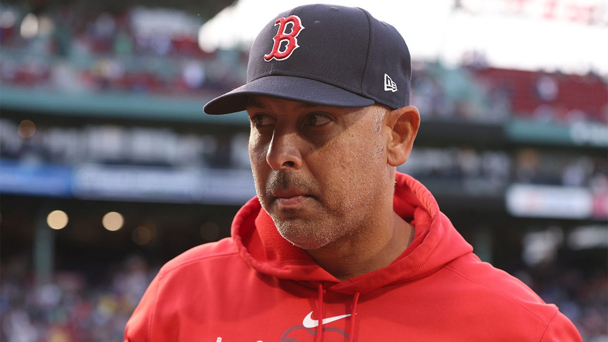 Manager Alex Cora of the Boston Red Sox looking on at Fenway Park.