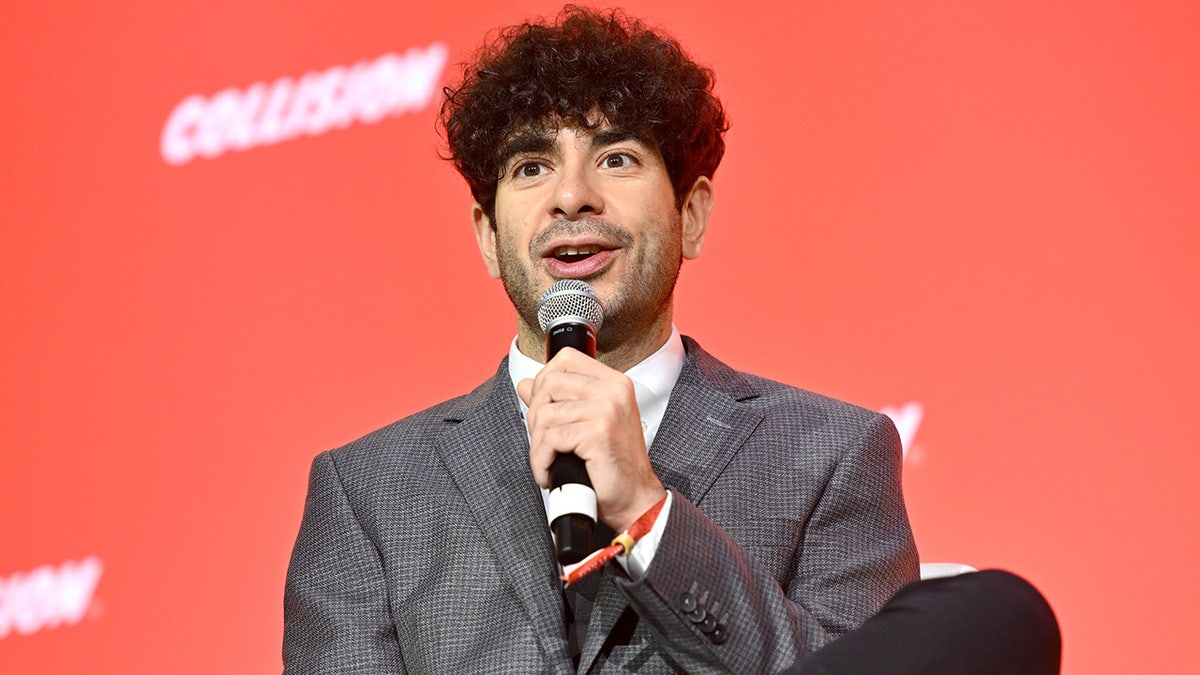 Tony Khan speaking on stage at Collision 2023 in Toronto