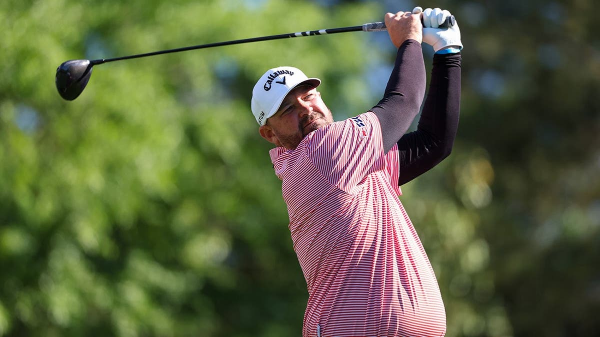 Brandon Holtz playing a golf shot from the fifth tee at Augusta National Golf Club