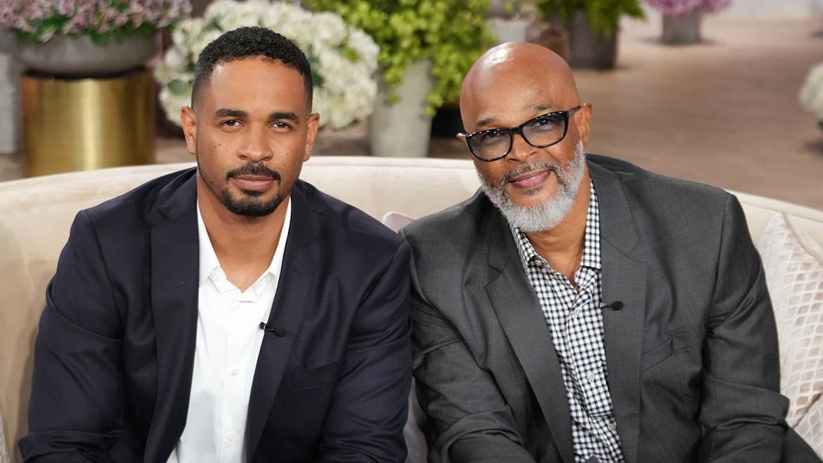 Damon Wayans Jr. and Damon Wayans seated on The Jennifer Hudson Show set in Burbank