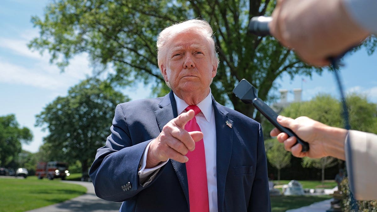 U.S. President Donald Trump speaking to media on the South Lawn of the White House
