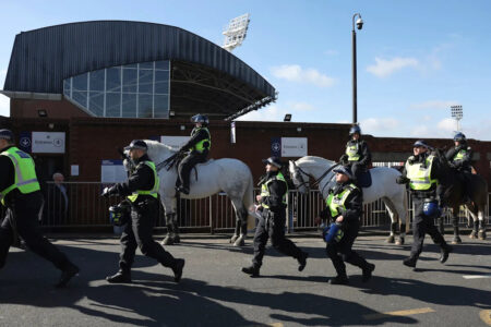 Millwall fumes after anti-racism booklet shows its badge on a Ku Klux Klan robe