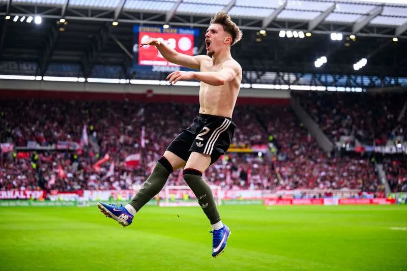 Bayern Munich's Lennart Karl celebrates scoring his side's third goal during the German Bundesliga soccer match between SC Freiburg and Bayern Munich at Europa-Park Stadium. Tom Weller/dpa