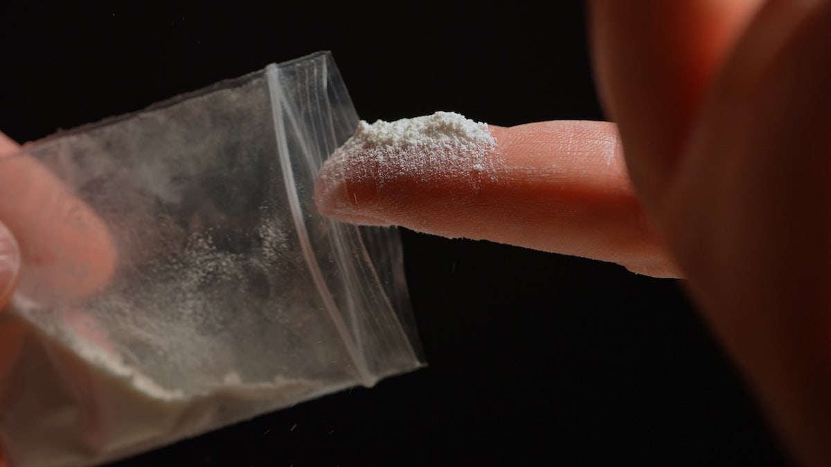 Person with fentanyl powder on finger