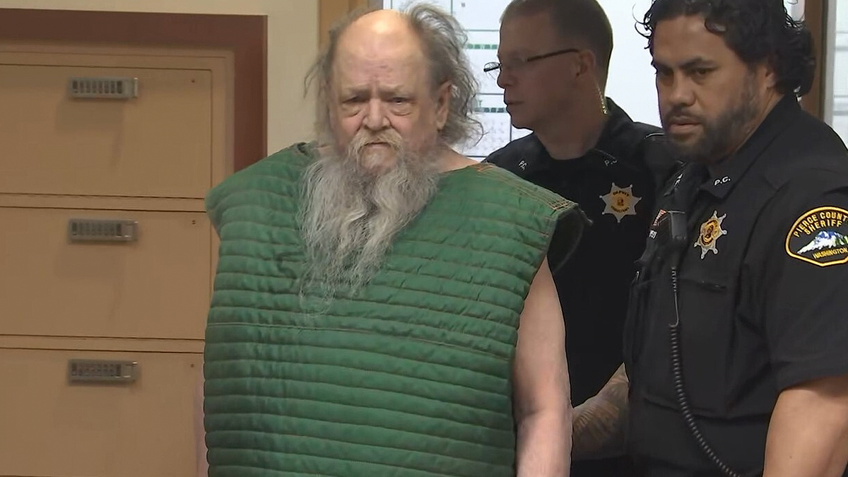 James Randle escorted by deputies in custody after arrest in 1992 Washington cold case murder