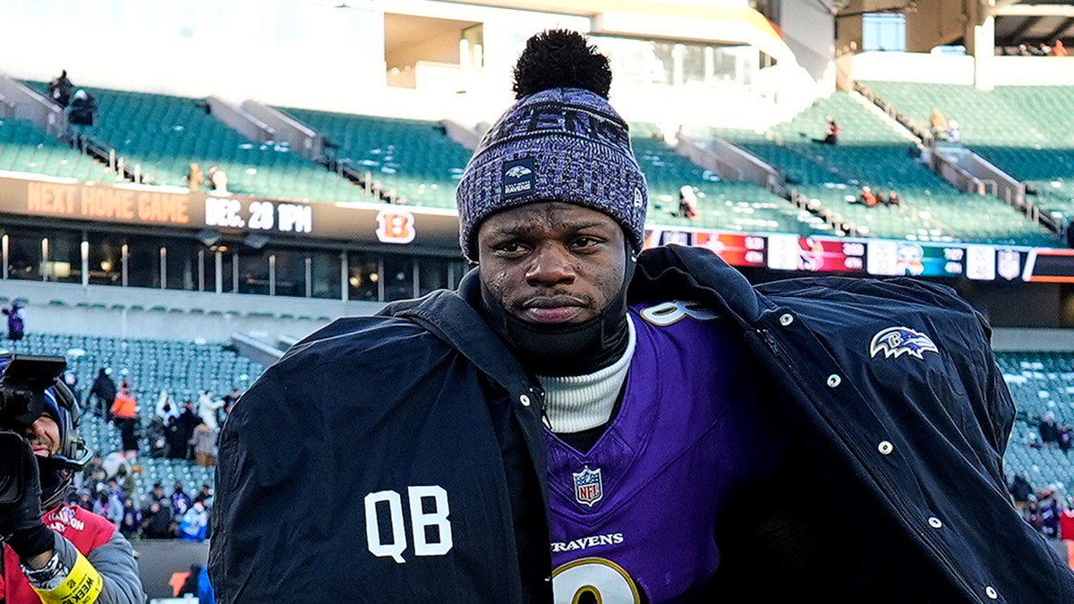 Baltimore Ravens quarterback Lamar Jackson walking off the field after a game.