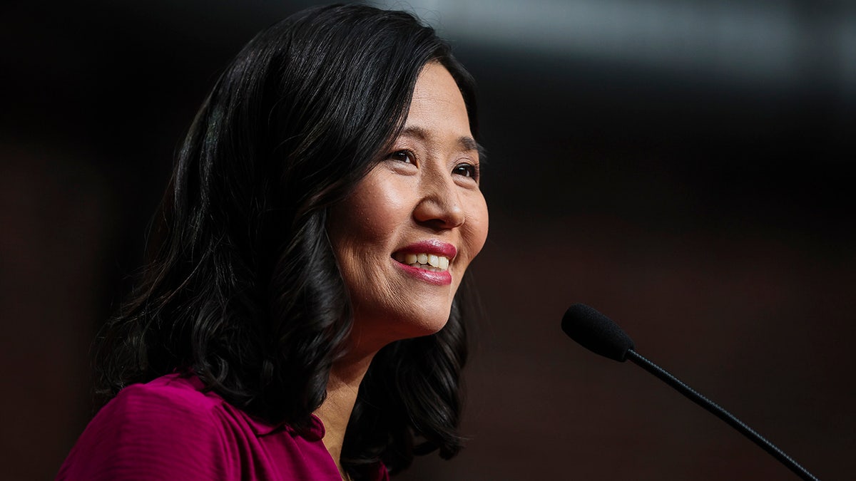 Boston Mayor Michelle Wu smiling while addressing supporters at campaign launch