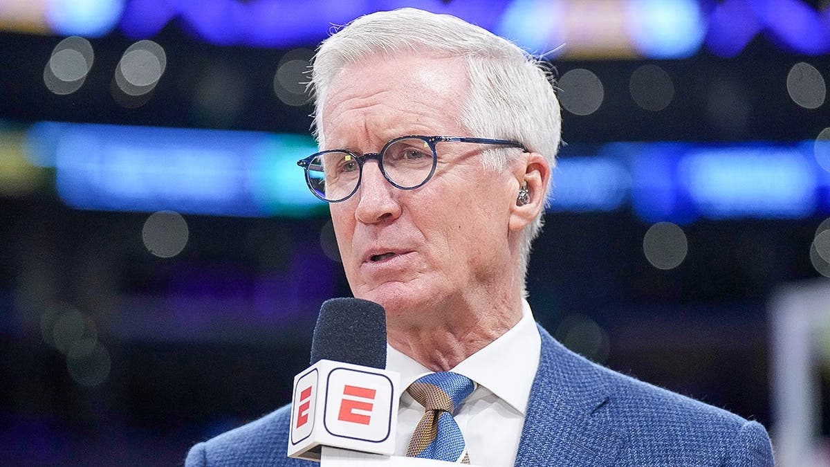 ESPN play-by-play announcer Mike Breen speaking during a basketball game at Crypto.com Arena