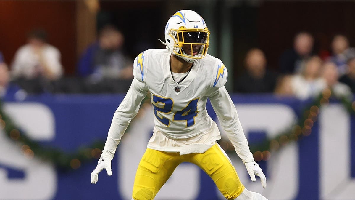 Nasir Adderley wearing number 24 Los Angeles Chargers jersey covering during NFL game at Lucas Oil Stadium