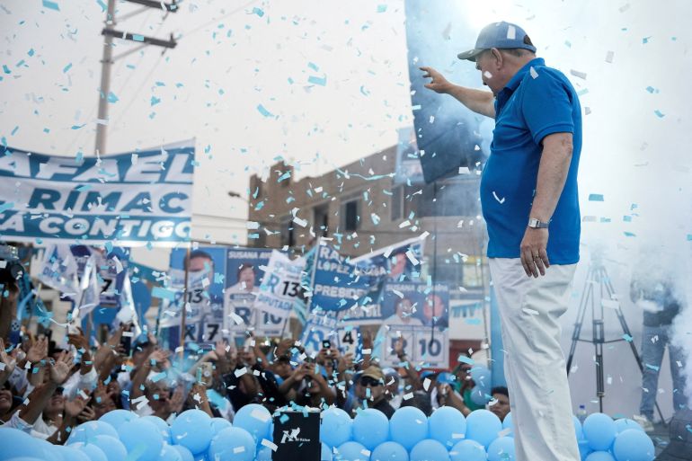 Peru's presidential candidate Rafael Lopez Aliaga gestures towards his supporters during a campaign rally ahead of the April 12 general election, in Lima, Peru, April 4, 2026. REUTERS/Angela Ponce