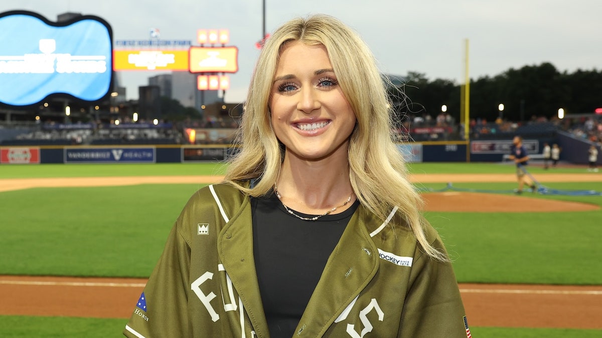 Riley Gaines on baseball field