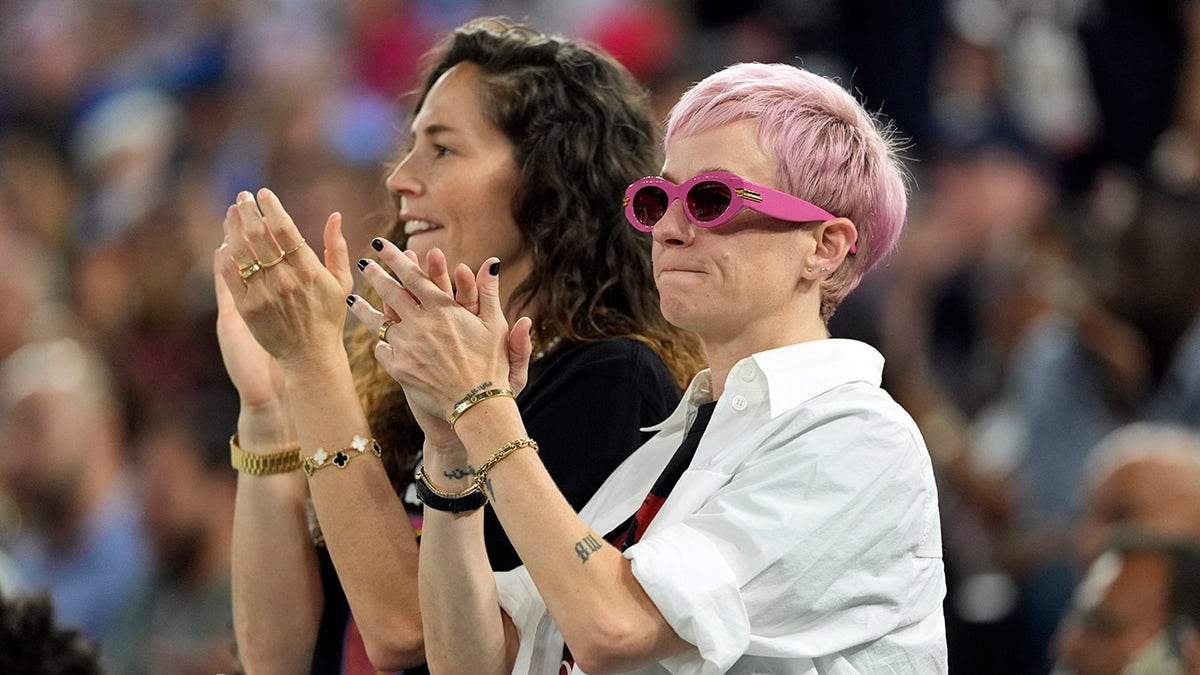 Sue Bird and Megan Rapinoe watching men's basketball gold medal game at Accor Arena