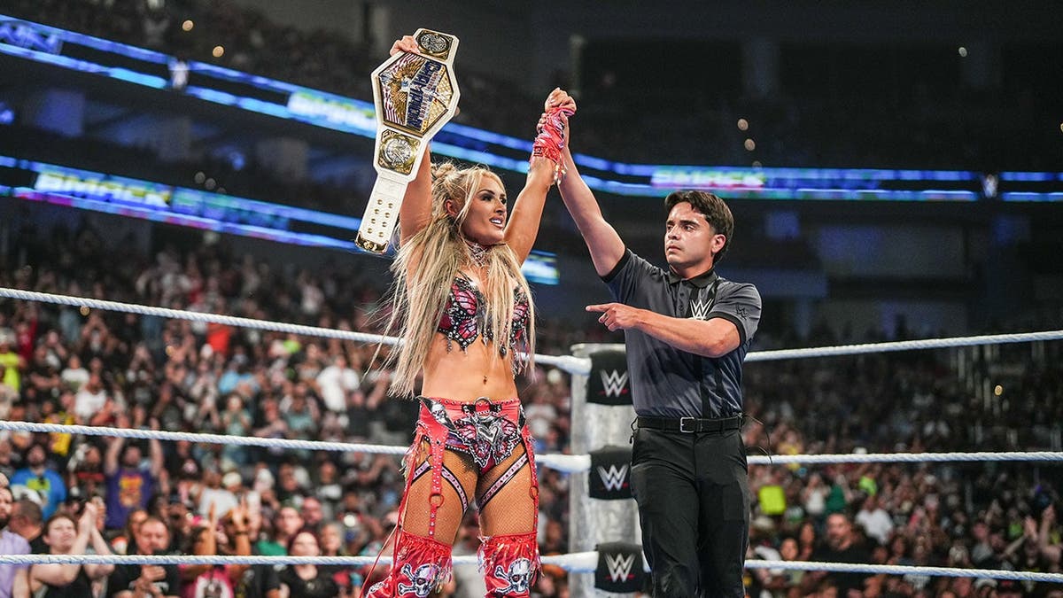 Tiffany Stratton celebrating as WWE Women's United States Champion in Dickies Arena