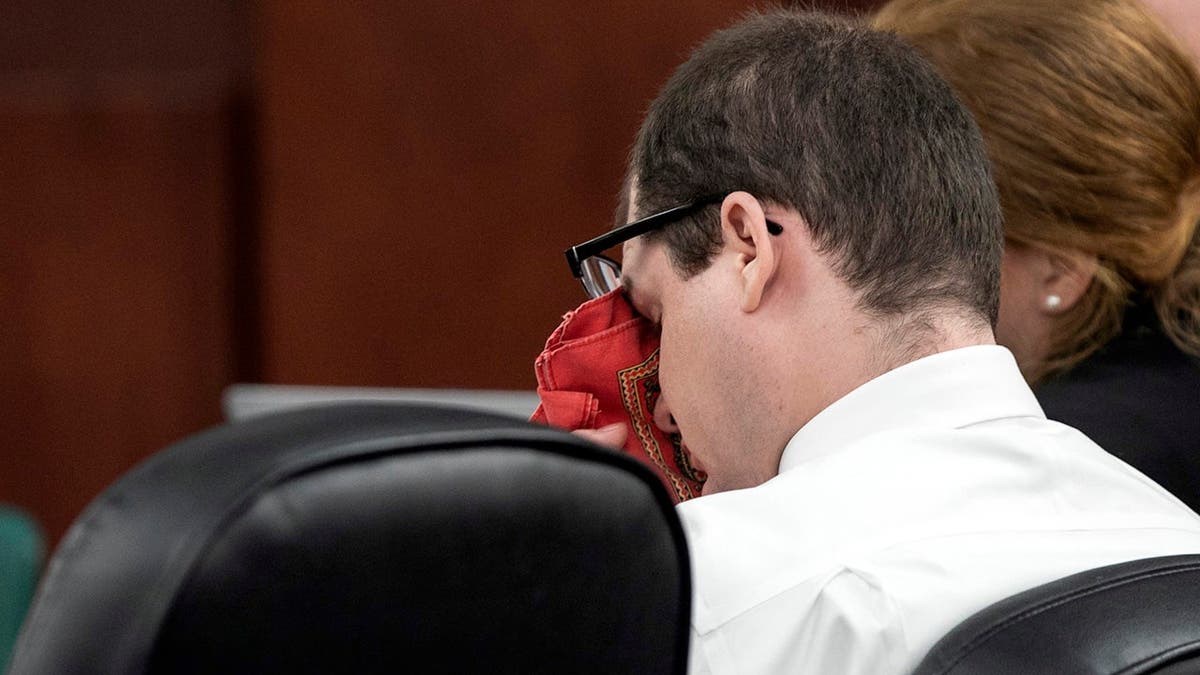 Tim Jones wiping his eyes during trial testimony in Lexington, South Carolina.