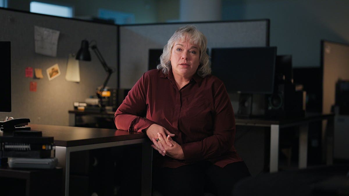 Special Agent Dawn Martin standing in a scene from Trust Me: The False Prophet Season 1