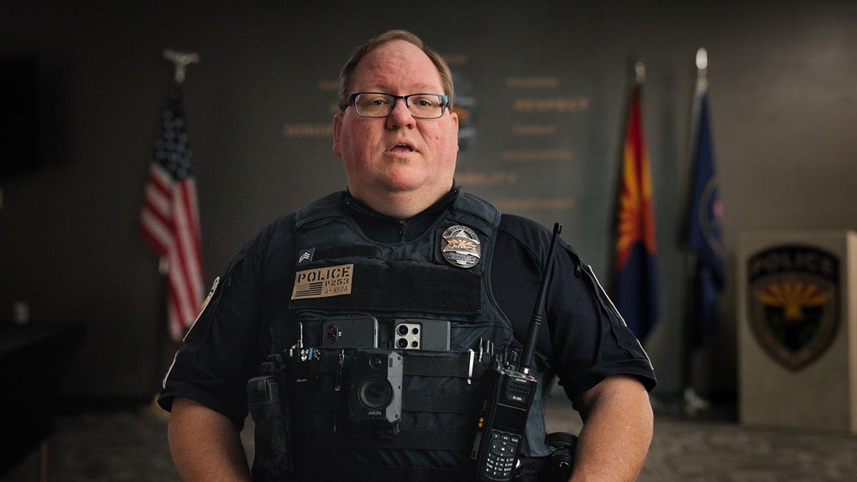 Sgt. David Wilkinson standing in a scene from Trust Me: The False Prophet Season 1