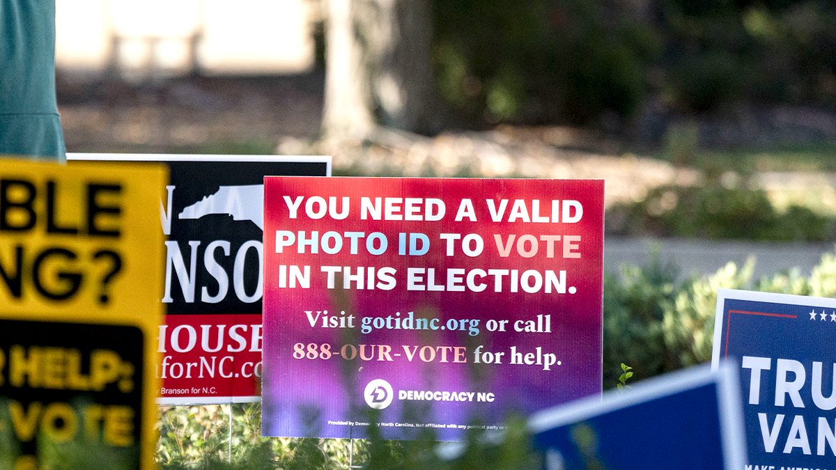 Signage about voter identification posted outside a polling location at the old Guilford County Courthouse in Greensboro, North Carolina