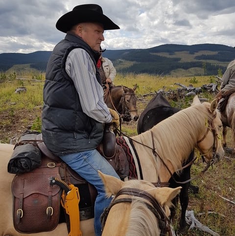 A man on a horse.