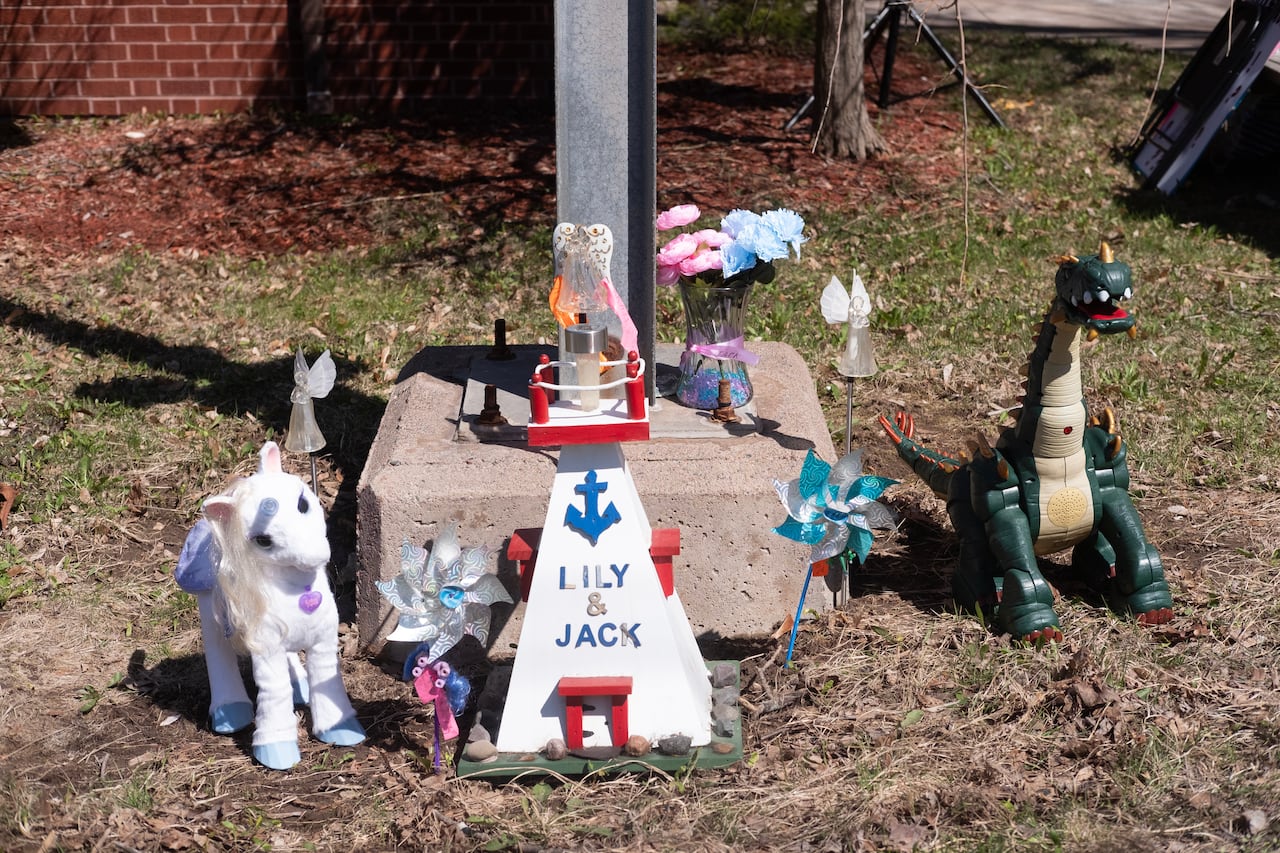 Mementoes are left for two missing children outside of an RCMP detachment.
