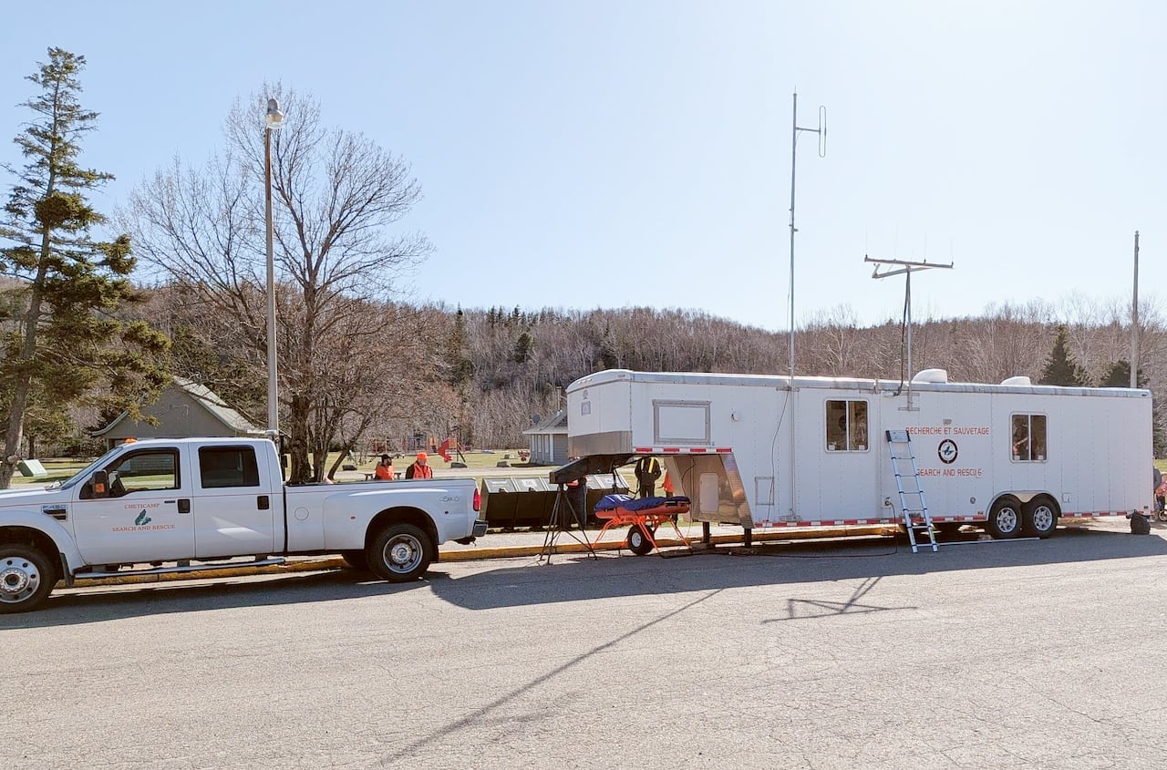 Cheticamp Search and Rescue officials have set up in Parks Canada's visitor information centre parking lot after a 62-year-old woman from Australia was reported missing.