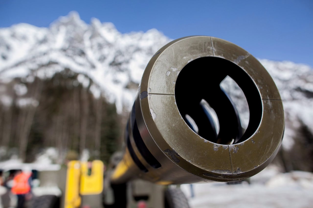 A close-up image of a large gun's nozzle.