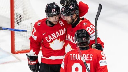 Crosby tallies 4 assists in 3rd-period surge as Canada routs Denmark to remain perfect at worlds