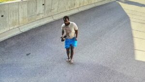 Minnesota fraud suspect who jumped from building is arrested, FBI says
