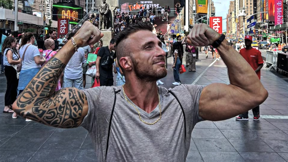 Cristiano Argento strikes a pose