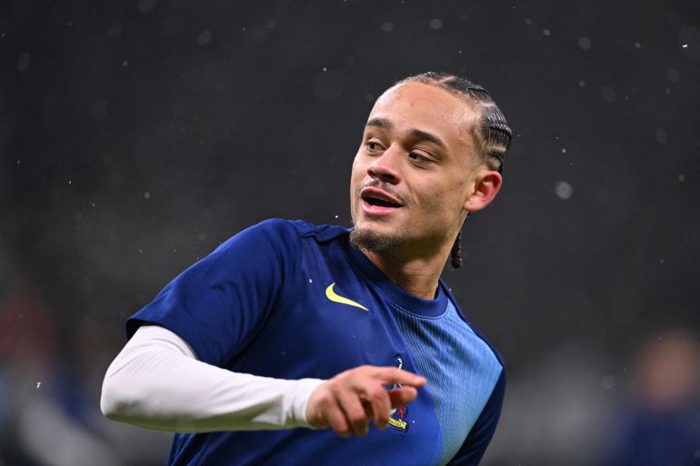 Tottenham Hotspur's Dutch midfielder #07 Xavi Simons warms up prior to the UEFA Champions League league phase- day 8 football match between Eintracht Frankfurt and Tottenham Hotspur in Frankfurt, western Germany, on January 28, 2026.