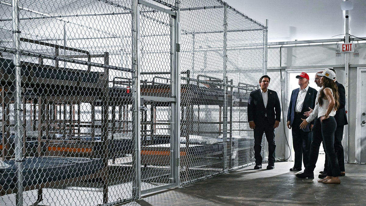 President Donald Trump and Florida Governor Ron DeSantis tour migrant detention center Alligator Alcatraz in Florida