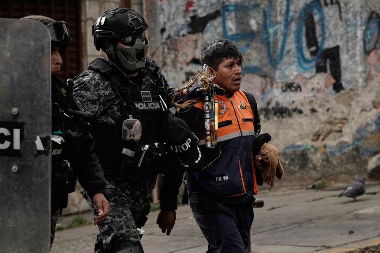 Police detain a demonstrator during an anti-government protest in La Paz, Bolivia, Monday, May 18, 2026. (AP Photo/Freddy Barragan)