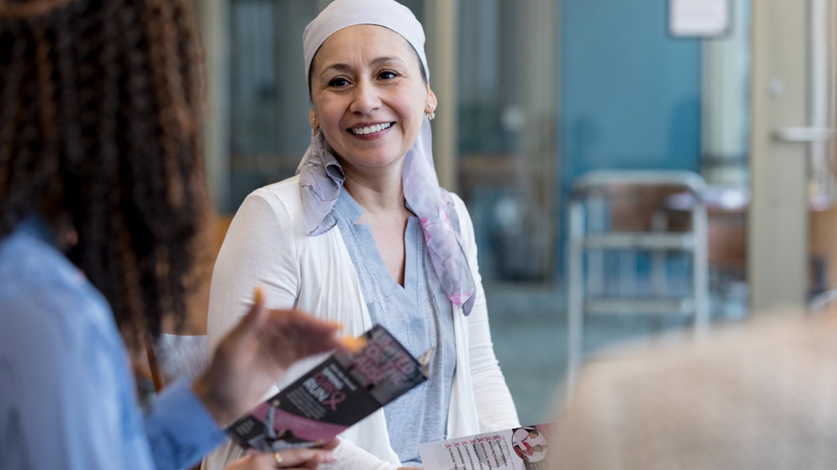 Breast cancer survivor smiling brightly