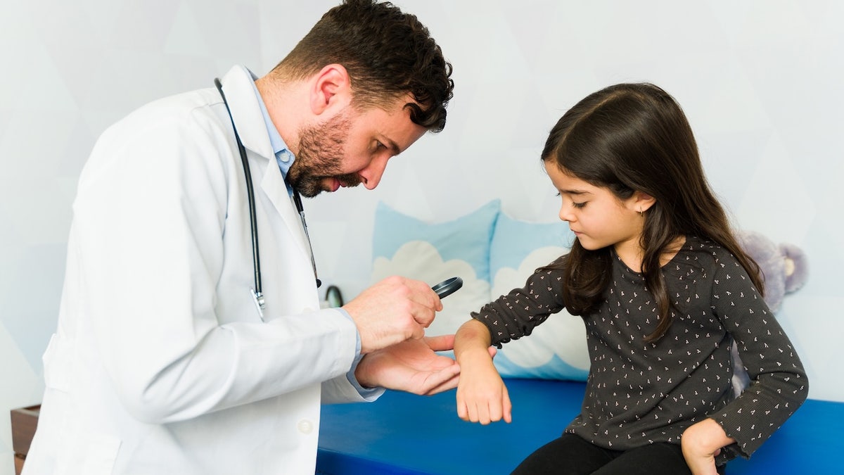 Girl at doctor