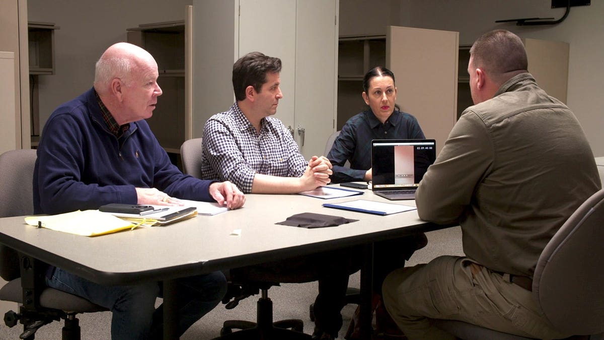 Ken Maxwell, Shannon, and Eric Evangelista meeting with Lieutenant John Eager.