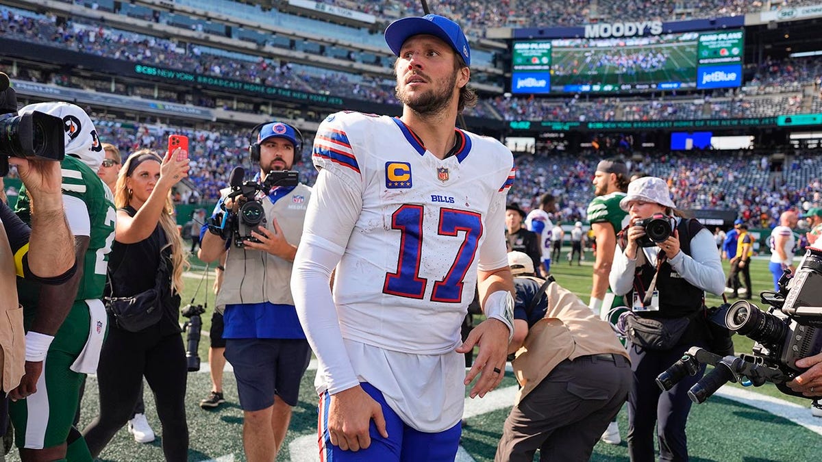 Buffalo Bills quarterback Josh Allen walking off the field in East Rutherford