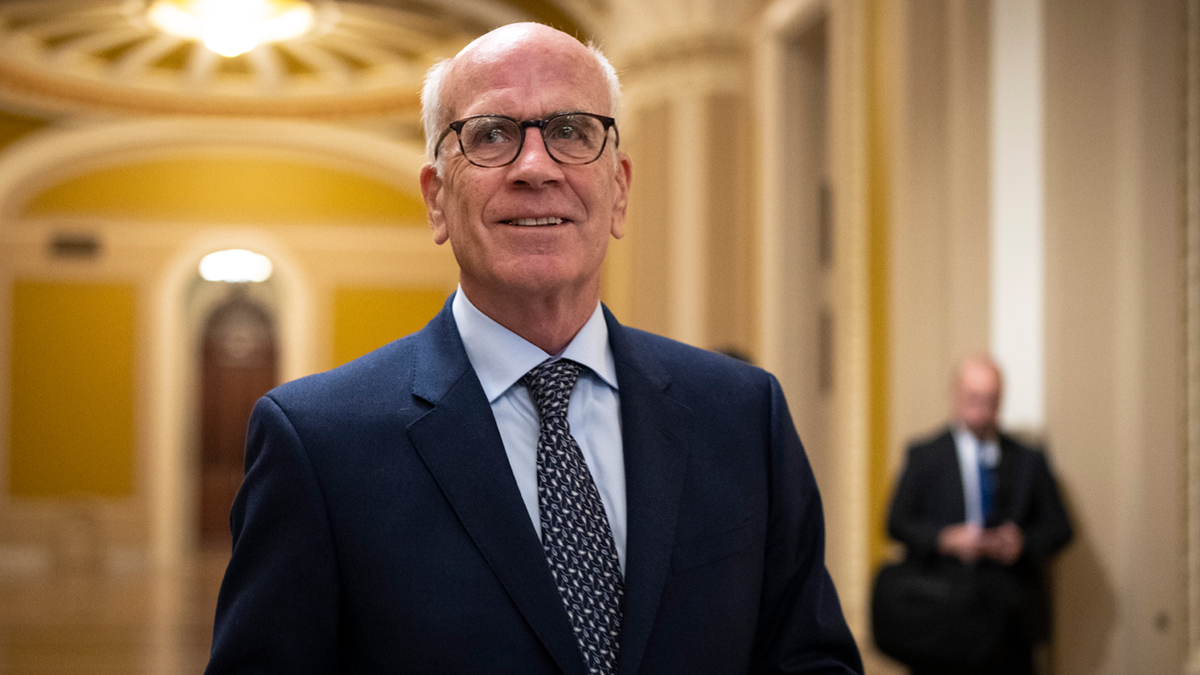 Sen.-elect Peter Welch walking through Senate hallways at the U.S. Capitol