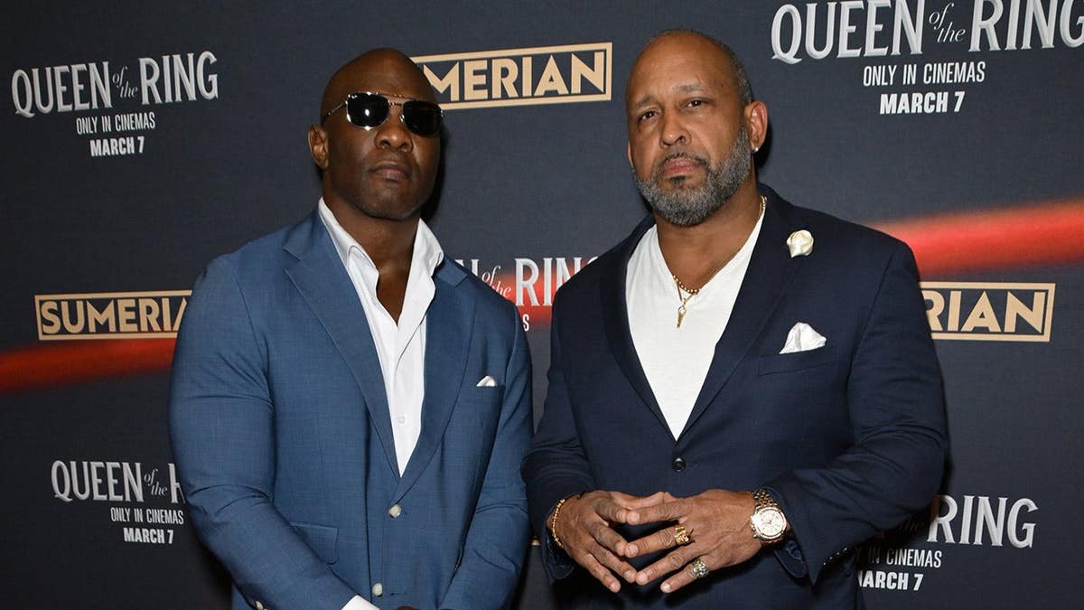 Wrestlers Shelton Benjamin and MVP standing together at a premiere event in Los Angeles