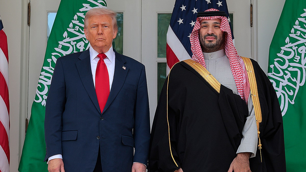 President Donald Trump and Crown Prince Mohammed bin Salman standing along the West Wing Colonnade at the White House