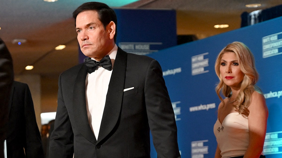 US Secretary of State Marco Rubio and his wife Jeanette Christina Dousdebes Rubio standing at the White House Correspondents' dinner