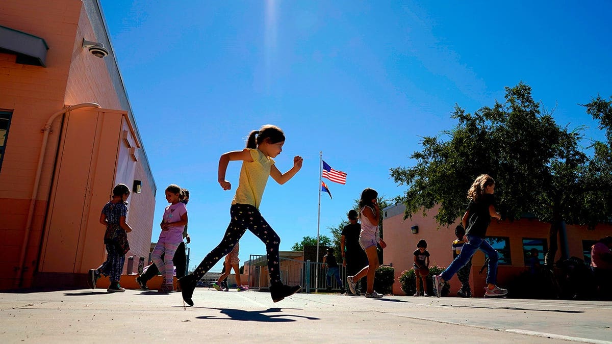 Whittier Elementary School students playing outside during recess in Mesa, Arizona