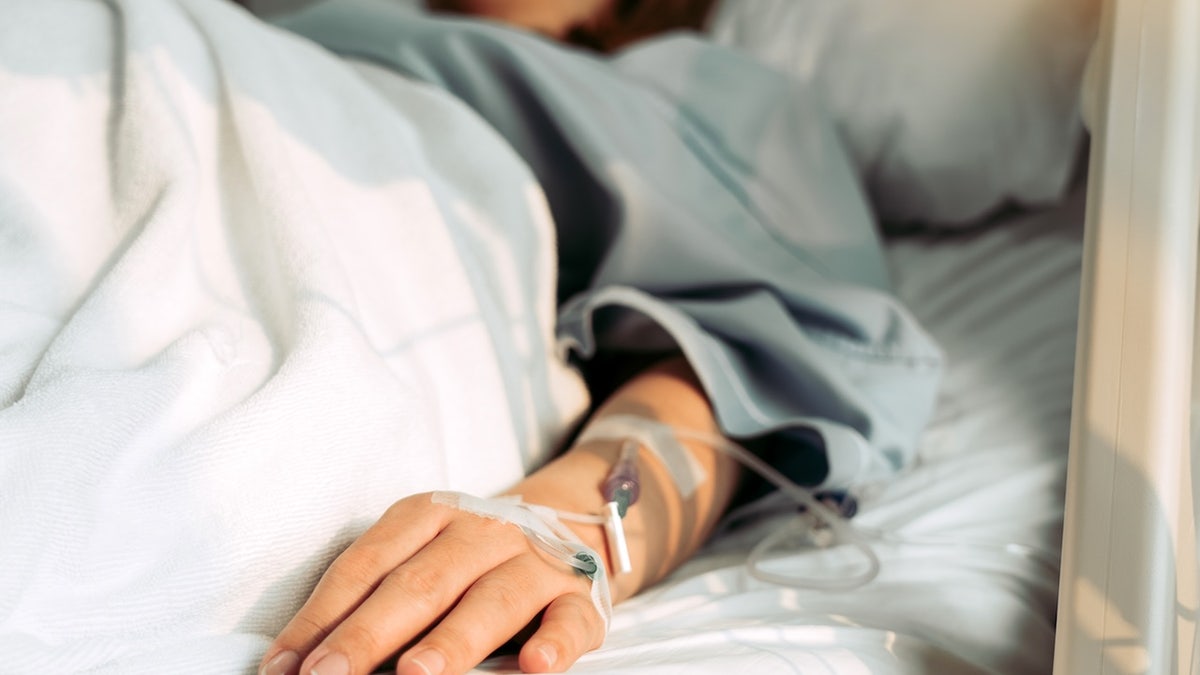 Woman getting IV at hospital