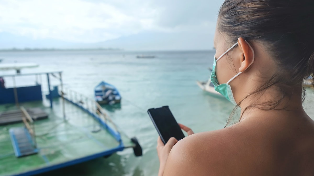 Woman wearing mask - cruise ship