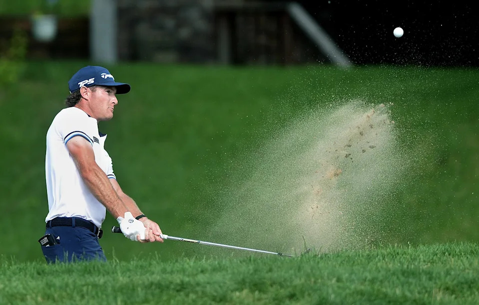 Drew Nesbitt hits the ball out of a bunker on the 17th green during the Korn Ferry Tour Memorial Health Championship at Panther Creek County Club Sunday, June 28, 2026.