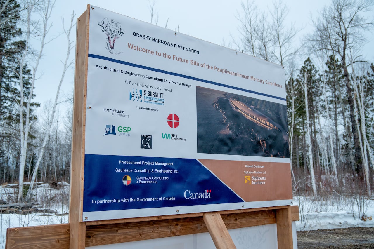 A sign is seen on a property in the winter.